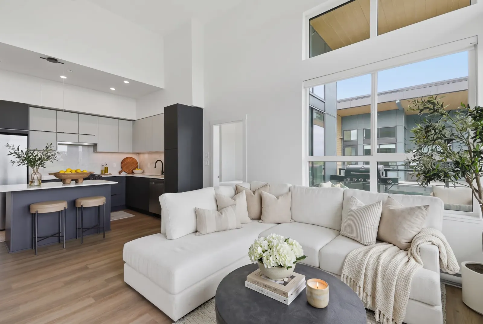 Bright open-plan living room and kitchen inside a completed Scott + 77 home, North Delta